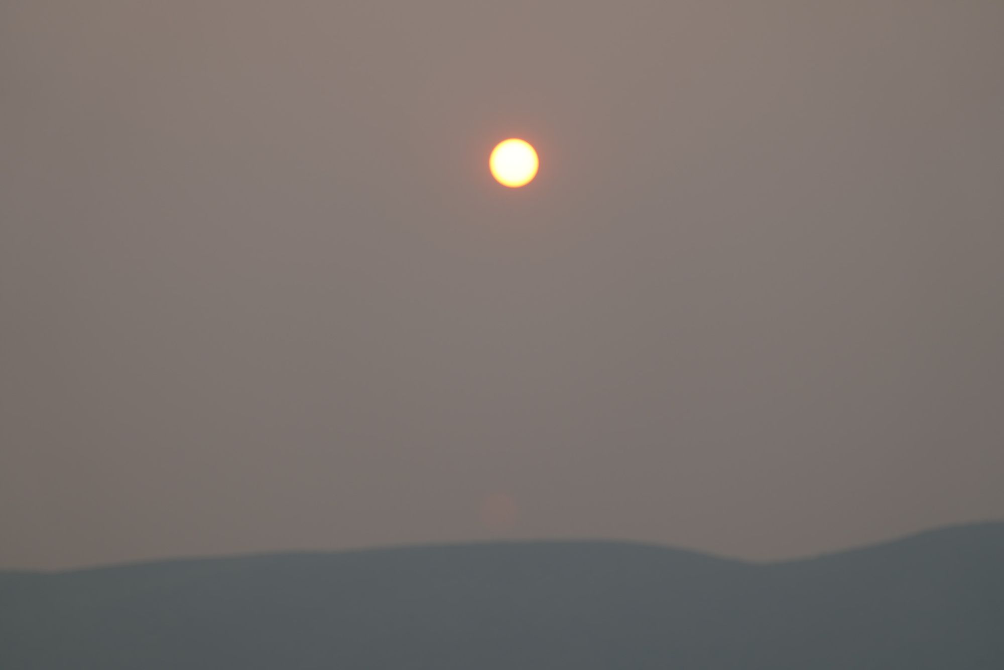 wildfire smoke and sun
