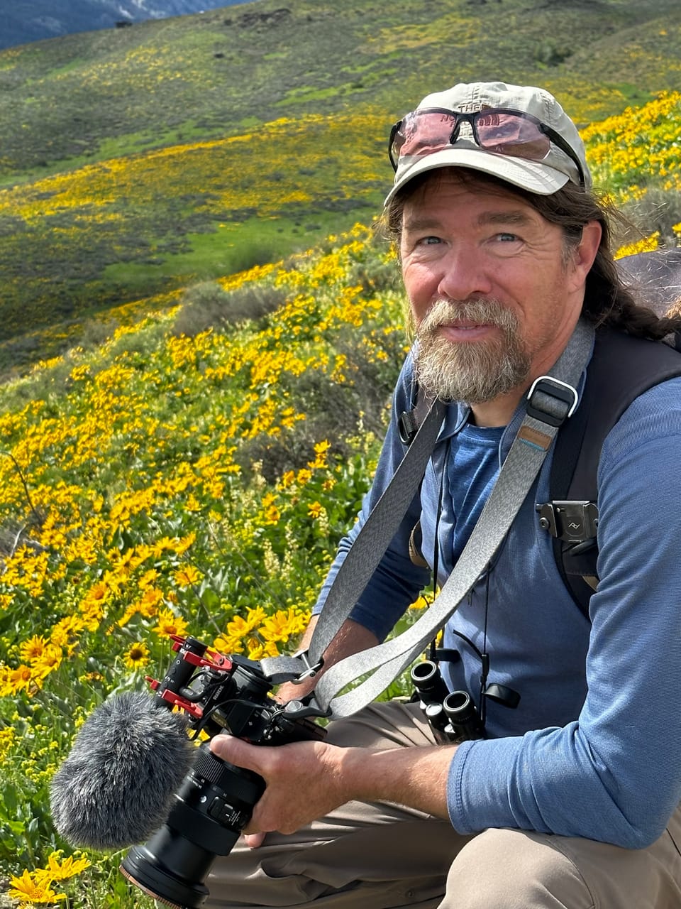 David Lukas among flowers